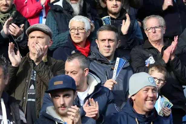 Watch Huddersfield Town fans' delight at Elias Kachunga's last gasp Derby County winner