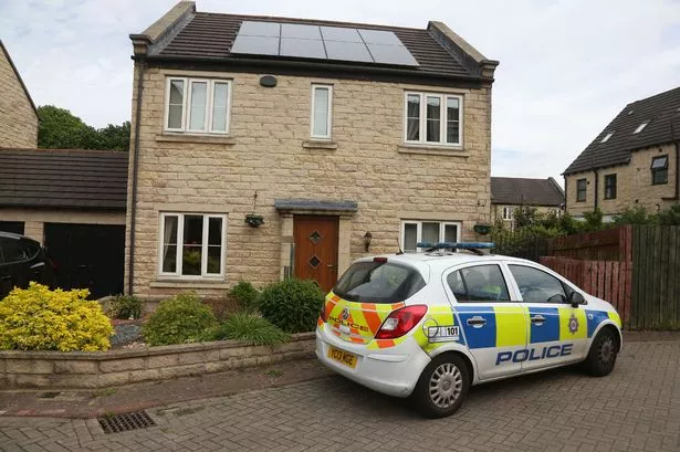 Woman, 59, found dead at Huddersfield house