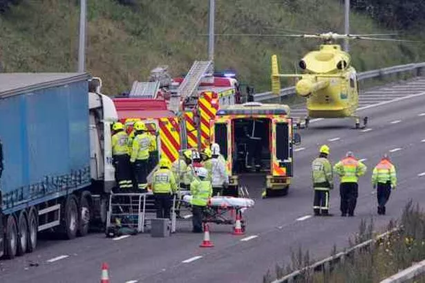 Image result for Air ambulance lands on M62 after car overturns in three car crash